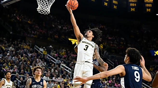 Burnett scores career-high 31, No. 2 Michigan routs Penn St 110-69 to reach school-record 21-1 mark