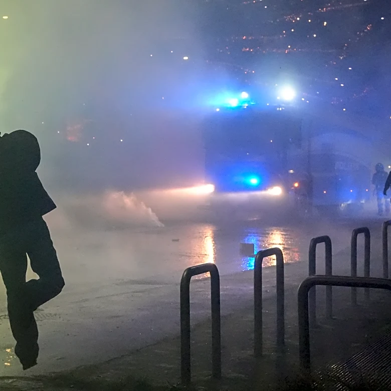 Italian police fire tear gas as protesters clash near Winter Olympics hockey venue