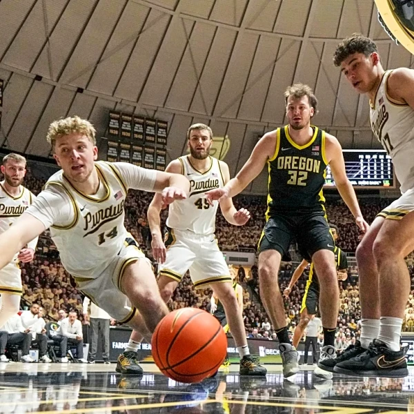 Fletcher Loyer's final minute-scoring flurry helps No. 12 Purdue rally late to get past Oregon 68-64
