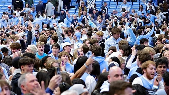 Duke's Scheyer says staff members 'got punched in the face' during court-storming; UNC AD apologizes