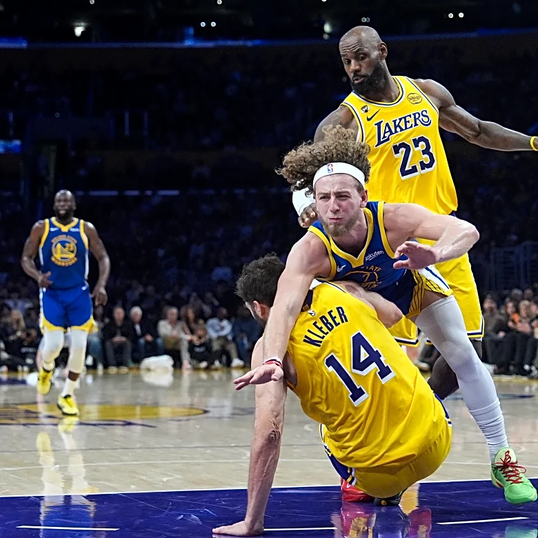 LeBron James has 20 points, 10 assists to lead Luka-less Lakers past Warriors