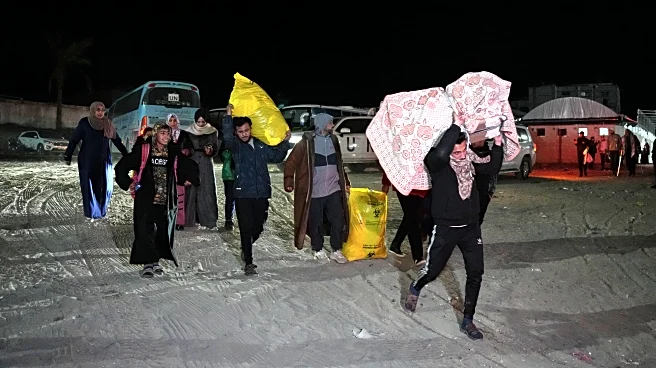 Palestinians attempt to cross between Gaza and Egypt at the Rafah border crossing