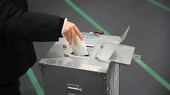 Exit poll shows Japan Premier Takaichi's ruling bloc on path to win a majority in lower house vote