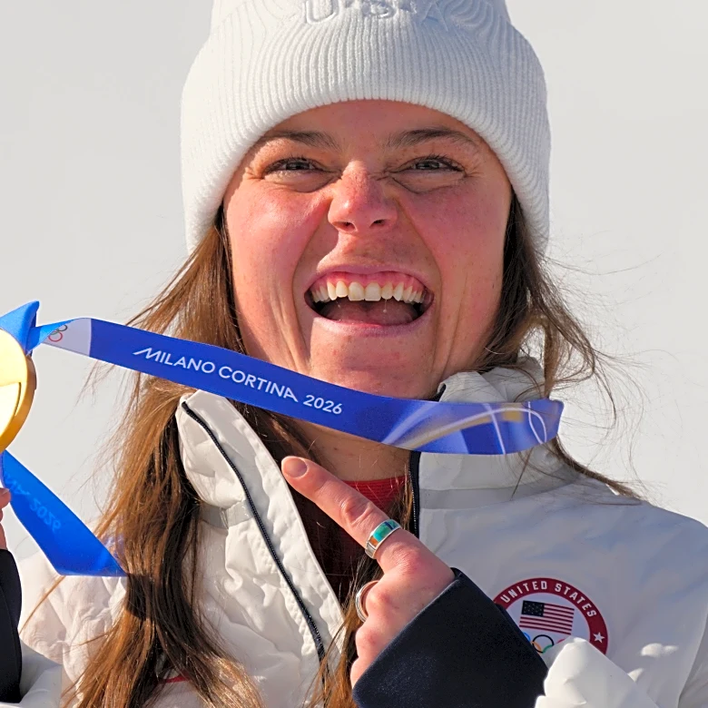 Breezy Johnson's winding road leads to Olympic downhill gold for US on day marred by Vonn's crash