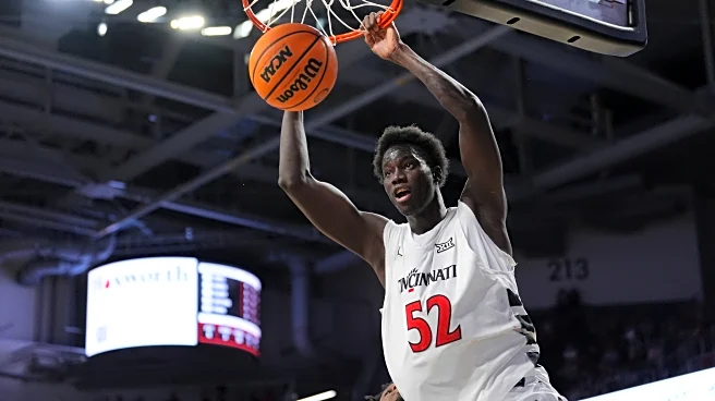 Baba Miller has 17 points, 10 rebounds and 5 assists to help Cincinnati beat UCF 92-72