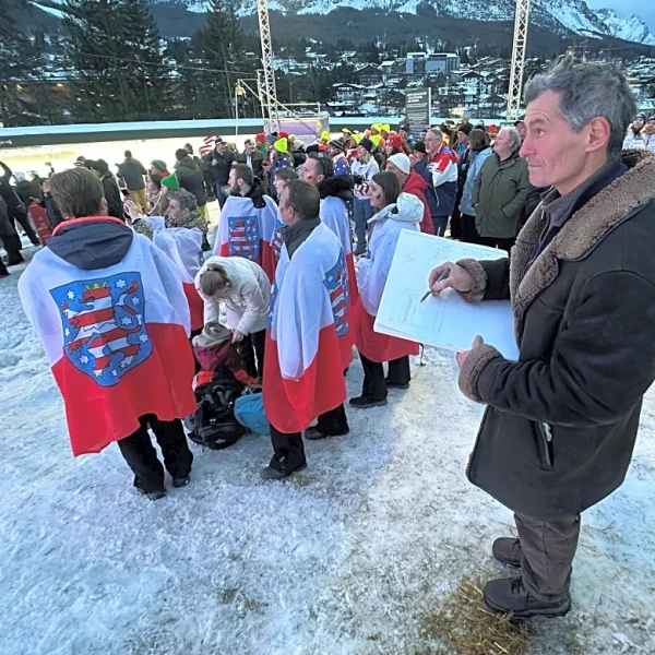 French artist finds happiness drawing spectators at his 17th Olympics in Cortina
