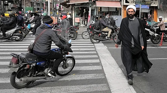 Iran commemorates 1979 revolution as nation is squeezed by anger over crackdown and tensions with US