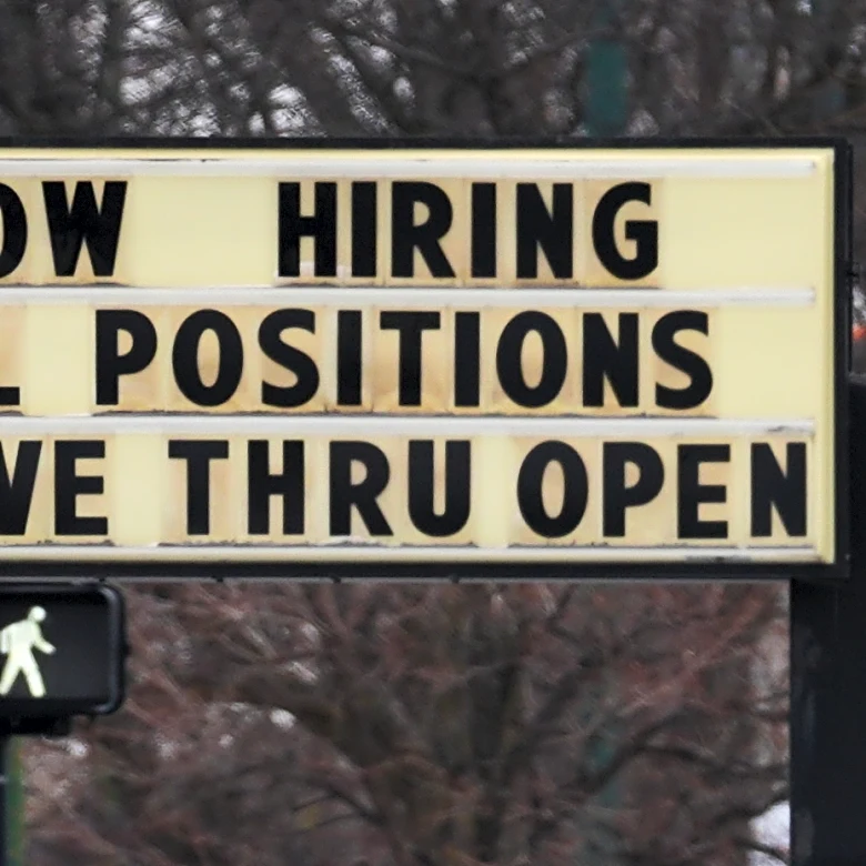 US adds surprising 130,000 jobs last month yet revisions cut hundreds of thousands of jobs last year