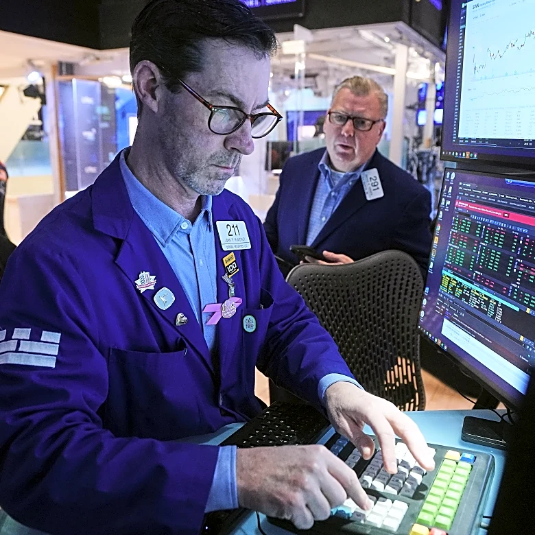 Wall Street rises to record levels after report showing the jobless rate improved last month