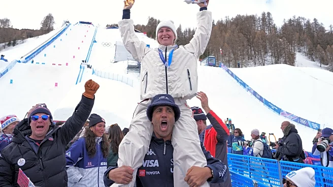 America's freestyling 'Lizard' leads a gold-silver medal grab in women's ski moguls