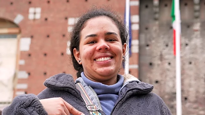 Milan's Olympic pin mania has collectors running between landmarks and swarming a trading center