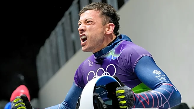 Weston gets his 1st Olympic skeleton gold medal, in race where Heraskevych was DQ'ed before start