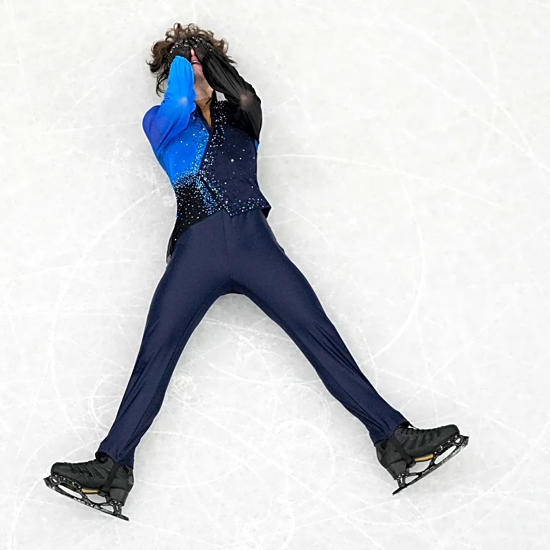 Mikhail Shaidorov earns gold in men's figure skating after collapse by 'Quad God' Ilia Malinin
