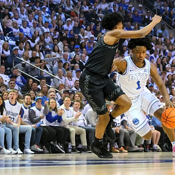 Rob Wright scores career-high 39 points to help No. 22 BYU edge Colorado in OT