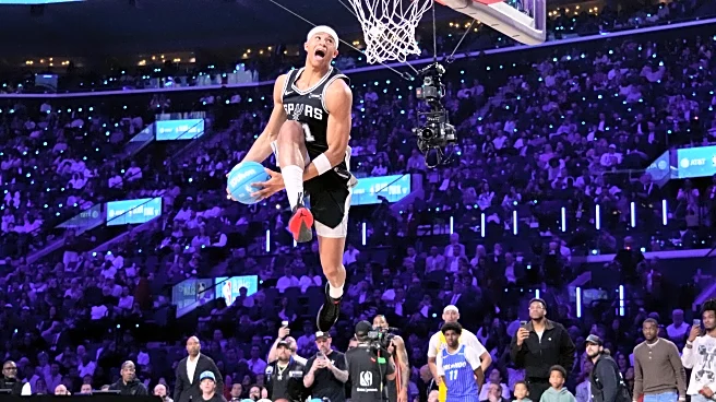 Heat's Keshad Johnson soars to a slam dunk title, edging Carter Bryant who had a perfect score