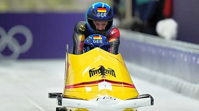 Germany's Johannes Lochner starts fast in Olympic 2-man bobsled race