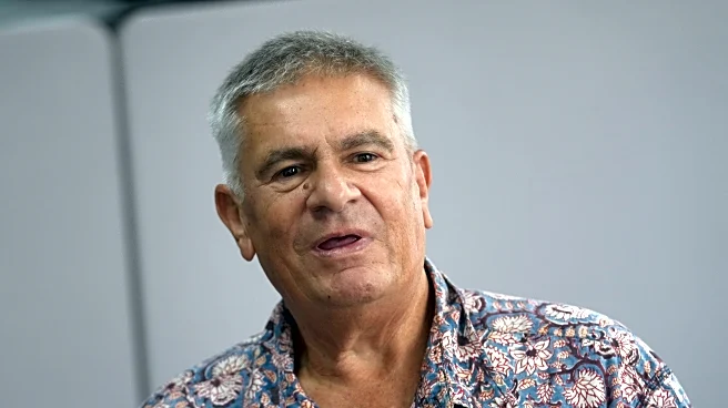 A writer is cleared by Thai court after Malaysian agency withdraws defamation case