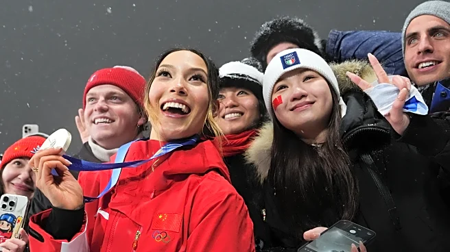Eileen Gu wins silver for 5th Olympic medal. Canadian Megan Oldham's gold is her 2nd of the Games