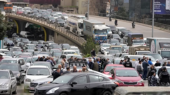 Protesters block Beirut roads after Cabinet approves new taxes that raise fuel prices