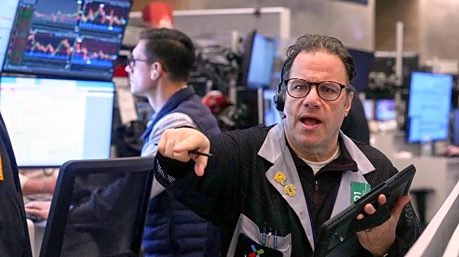 Wall Street swings on worries about tech stocks and discouraged US shoppers