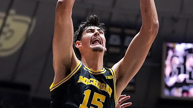 Elliot Cadeau scores 17 and No. 1 Michigan uses strong interior game to beat up No. 7 Purdue 91-80
