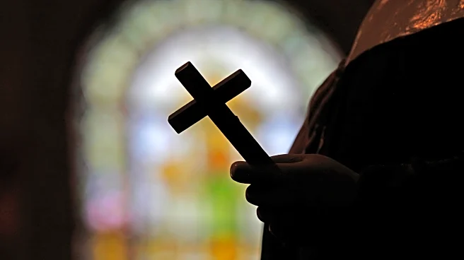A look at the largest clergy abuse settlements reached by Catholic organizations in the US