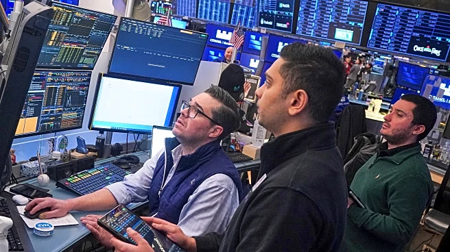 Most US stocks are falling, though gains for Walmart and Deere limit the damage