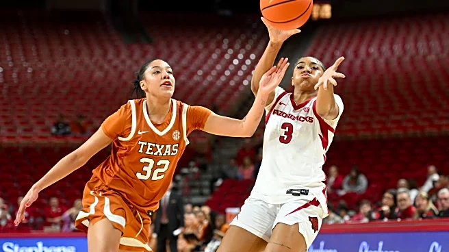 Booker leads five in double figures as No. 4 Texas defeats Arkansas 93-62