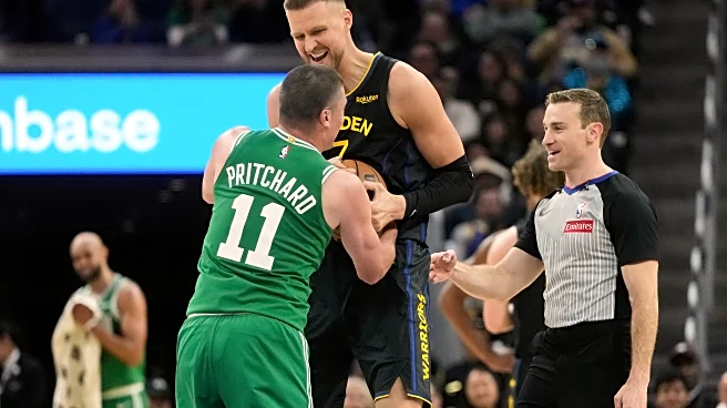 Brown helps Celtics thump Curry-less Warriors 121-110