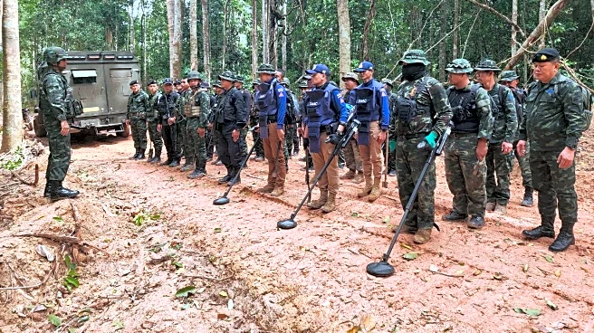 2 Cambodian journalists appeal treason convictions over a photo from Thai border clash