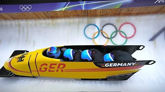 Germany's Johannes Lochner storms to a big early lead in Olympic four-man bobsled