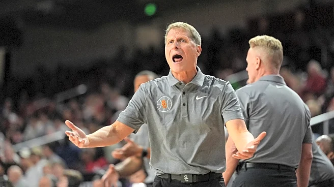 Evans scores 21 points and keys Oregon's 59-second, 7-0 run to stun USC 71-70