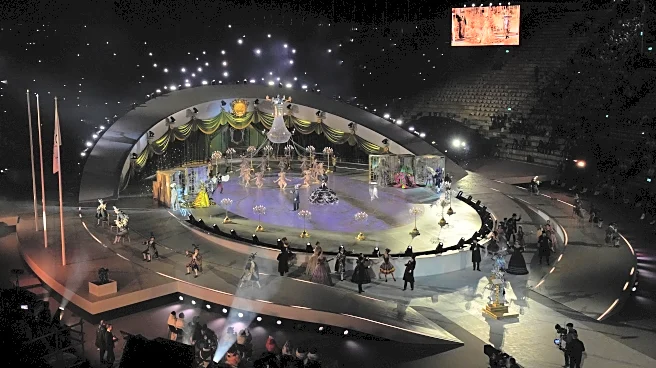 Twin Milan and Cortina Olympic cauldrons are extinguished, signaling the end of Winter Games