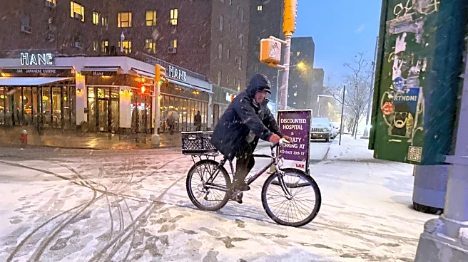 New York City hunkers down under blizzard warnings and a travel ban as winter storm hits northeast