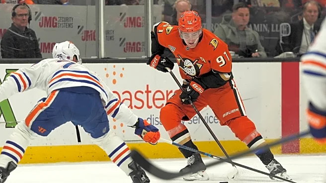 Joel Quenneville gets his 1,000th career win in Ducks' 6-5 comeback victory over Oilers