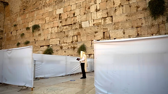 Israel's parliament moves toward ban on mixed-gender prayer at Jerusalem's Western Wall