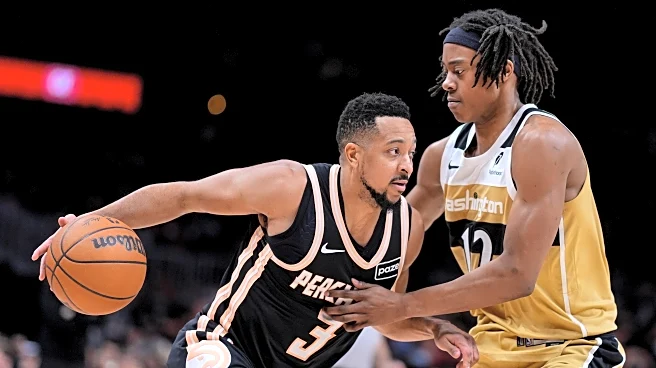 McCollum and Kispert combine for 58 points against former team in Hawks' 126-96 win vs Wizards