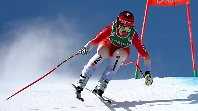 Swiss skier Suter wins 1st race since Olympics as chase starts for Vonn's World Cup downhill lead
