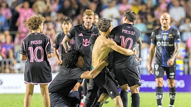 Lionel Messi knocked down as fans storm the pitch during Inter Miami friendly in Puerto Rico