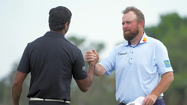 Shane Lowry and Austin Smotherman tied for the Cognizant Classic lead at 13 under