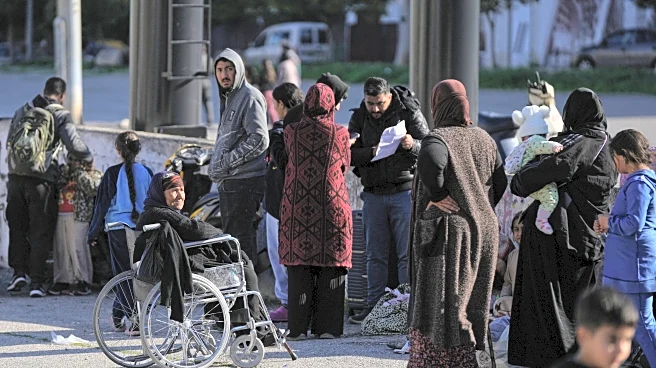 Families take shelter in schools as Lebanon’s government calls Hezbollah’s strike on Israel illegal