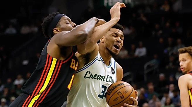 Hawks beat slumping Bucks 131-113 to win 5th straight and climb above .500