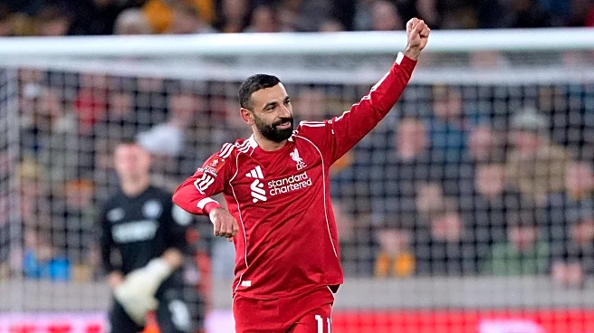 Robertson and Salah shine as Liverpool hits back to beat Wolves and reach FA Cup quarterfinals