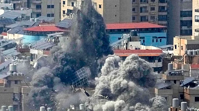 The Latest: Israel hammers Beirut and Tehran as Iran attacks more Israeli targets