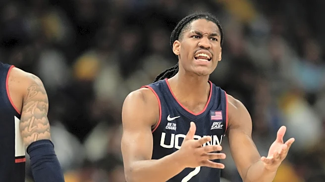 Hurley ejected in final second of Marquette's 68-62 win over No. 4 UConn