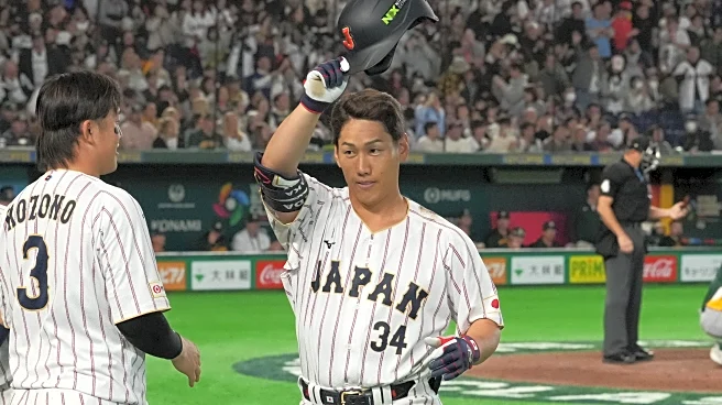 Japan rallies late to beat Australia 4-3, cliches first place in group at World Baseball Classic