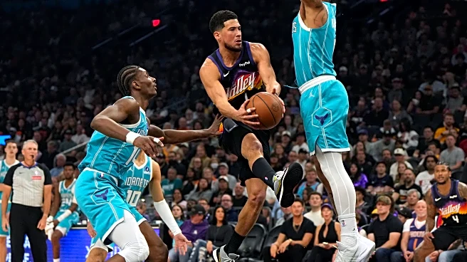 Booker scores 30 points as Suns halt Hornets' road winning streak at 10 with 111-99 victory