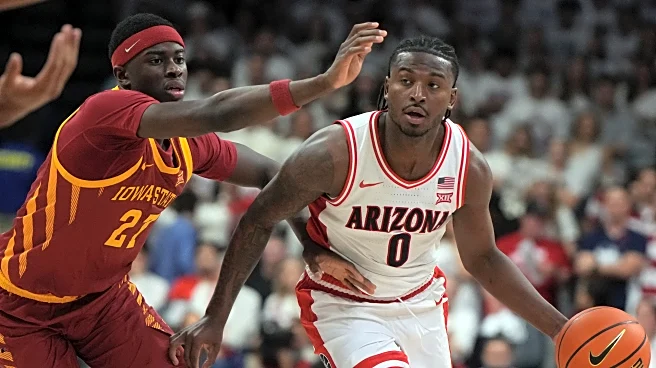 Arizona guard Jaden Bradley and coach Tommy Lloyd pick up Big 12 awards