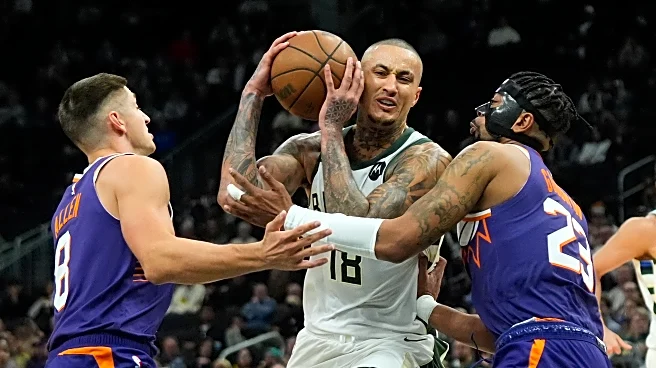 Hot-shooting Suns have three 20-point scorers in 129-114 victory over Bucks