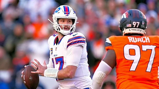 Bills and Josh Allen agree to restructure QB's contract in salary cap-saving move, AP source says